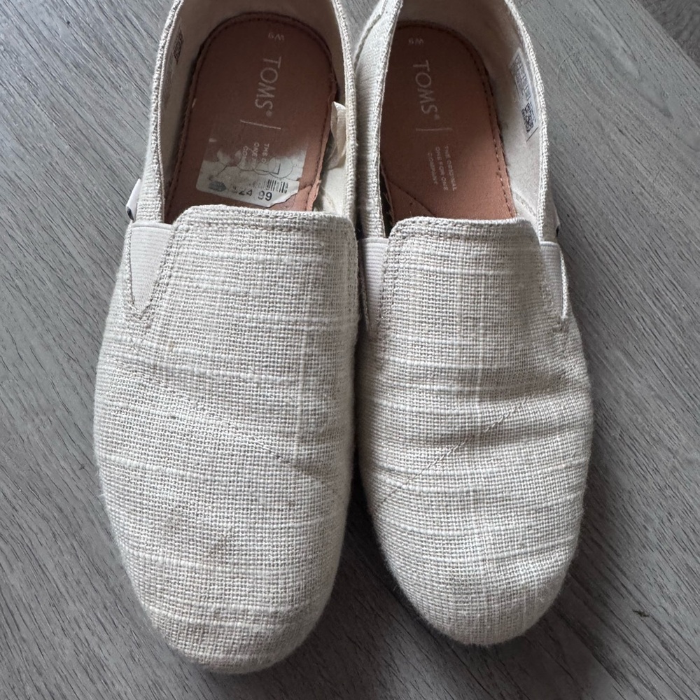 TOMS women Cream Slip-On Shoes